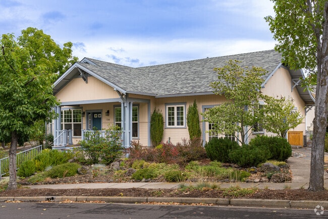 A lovely single-family home in Mountain Meadows is walking distance from the community garden.