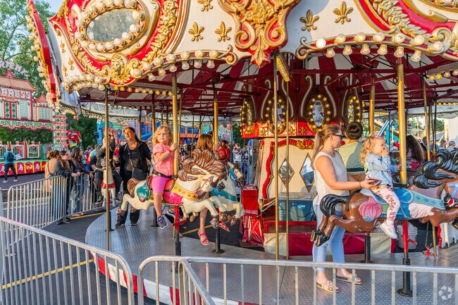 Families love the carousel at Darien Fest in Darien.