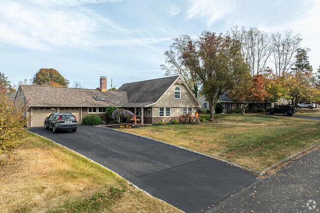 Some of the homes in Forsythia Gate are based in part on the Cape Cod-style home.