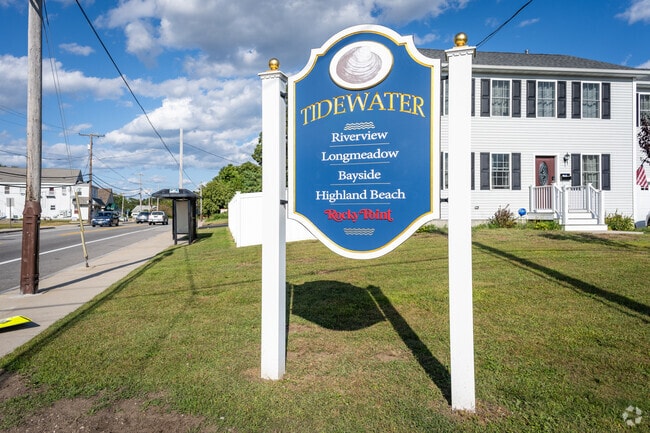The Tidewater sign in Long Meadow, RI, warmly welcomes you home.