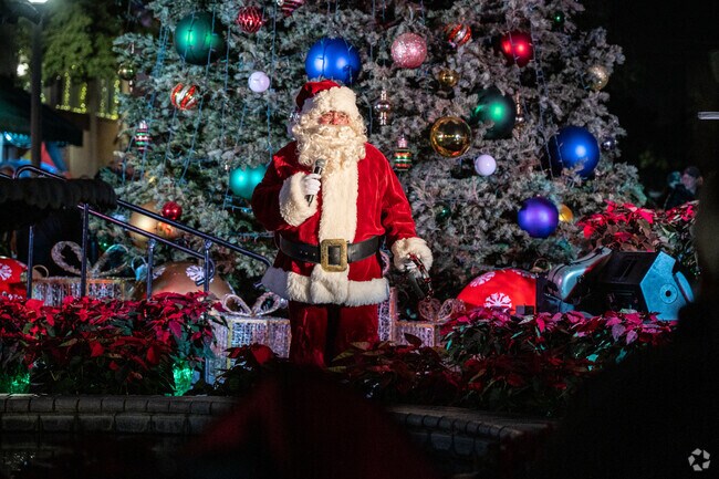 Santa Claus arrives annually at Magnolia Square in Downtown Sanford.