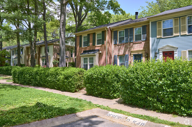 Townhomes in a shaded neighborhood in Montgomery Village, Maryland.