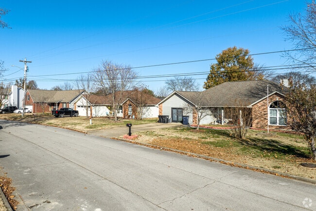 Some ranch homes in Santa Fe feature brick facades, adding a classic look to the neighborhood.