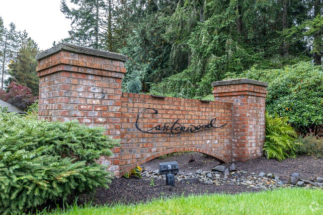 Canterwood sign near a colorful gated community.