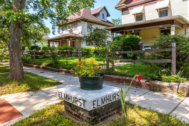 Tree-lined streets adorn Elmhurst, a small neighborhood with some of the oldest homes in Topeka.
