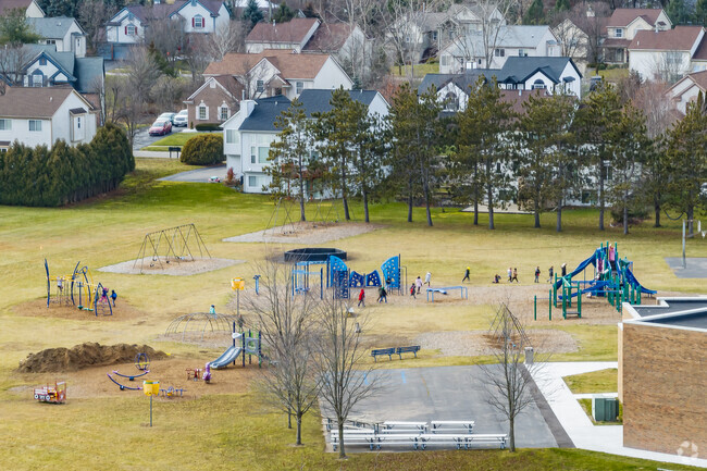 There is a large playground behind Savage Road Elementary School for students to enjoy.