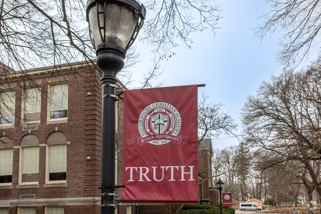 A powerful banner rests on the grounds of South Shore Christian Academy in Weymouth.
