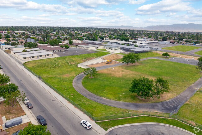 The track field at Ramon Garza Elementary is located in the Southwest end of the school.