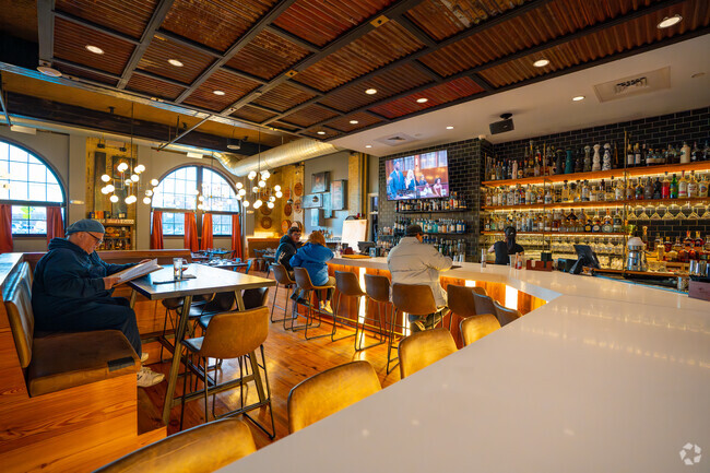 Sit at the bar, the high table, or a regular table at the Chelsea Station Restaurant and Bar.