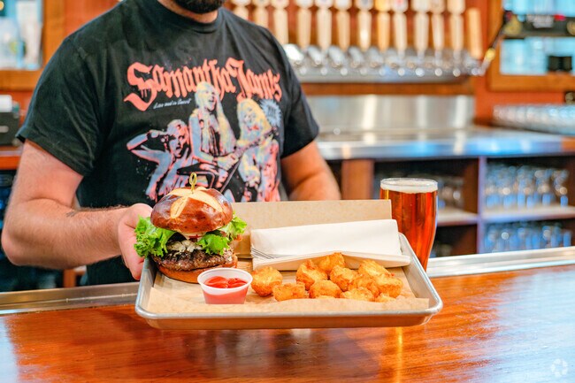 Come to Woody's in Lakeview for some fresh tater tots and a tasty burger.