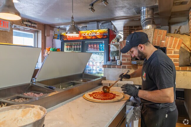 Pizzas are made to order at Soprano's Pizza next to South Londonderry.