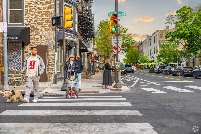Manayunks' walkable Main Street invites families to arts and dining during golden hour.