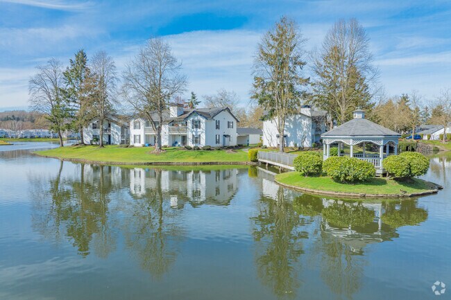 Live in a gorgeous condo looking out over the water in The Lakes.