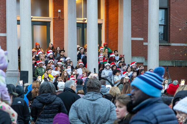 The local choir sings holiday classics at the Peabody Christmas Stroll and Tree Lighting.
