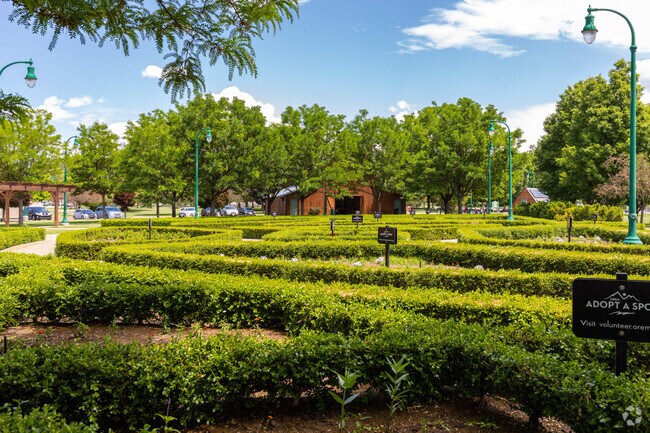 Gardens in nearby Nielsens Grove Park offer a vibrant and colorful display of flowers.