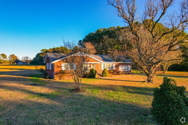 Brick bungalows are seen in Achilles/Browns Bay on mid-sized lots of land.