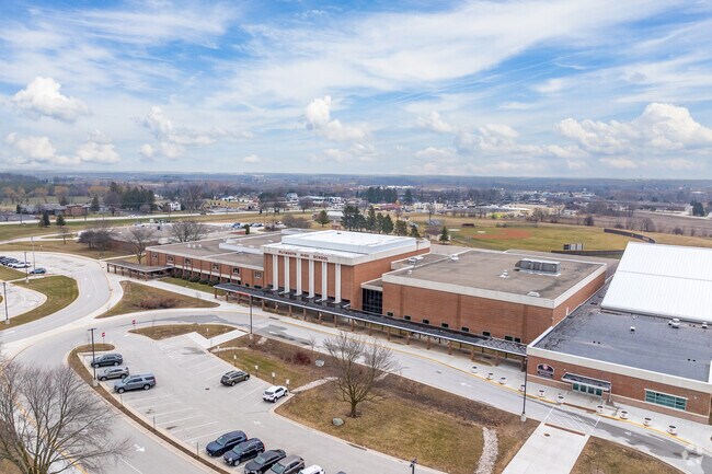 Plymouth High School scores a B by Niche.