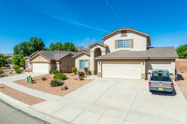 Stucco covered homes are the common style of houses found throughout West Los Lunas.