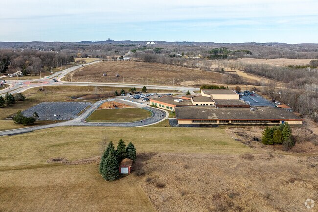 Friess Lake Elementary in Hubertus, WI offers large play areas for children to run and play.