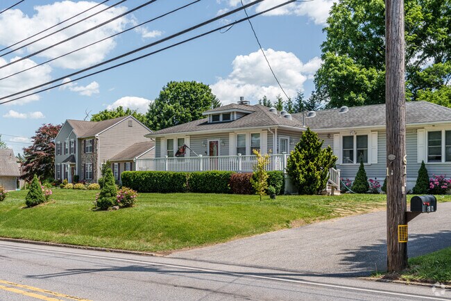 This Lima ranch home has a dormer to add extra space to match its two-story neighbor.