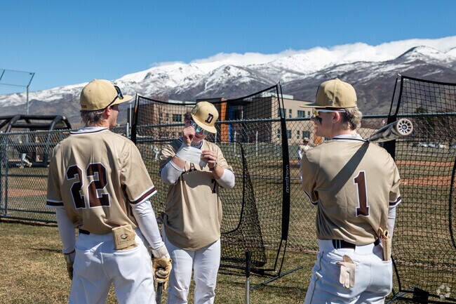 Davis High School baseball players get ready for a game in Kaysville.