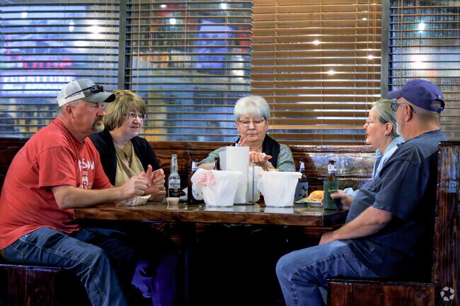 Savor Cajun classics at Old Bastards Bar & Grille near Margaret Place.