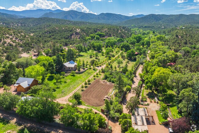 Most homes in Tesuque can be found on large lots with plenty of space & trees between neighbors.