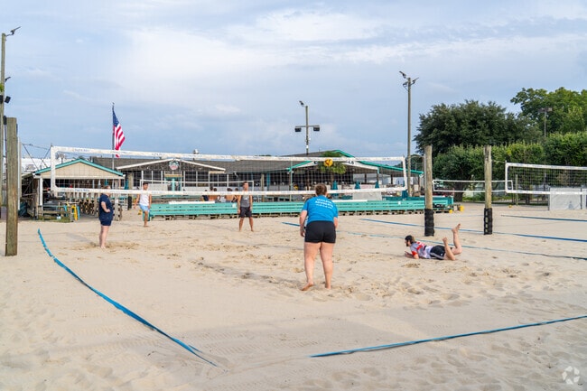 Locals gather for fun at Capt'n Bill's Backyard Grill & Volleyball.