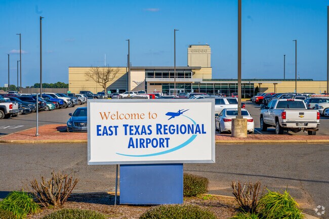 The welcome sign at East Texas Regional Airport in southern Longview stands in front of the main building, marking a key hub for regional travel.