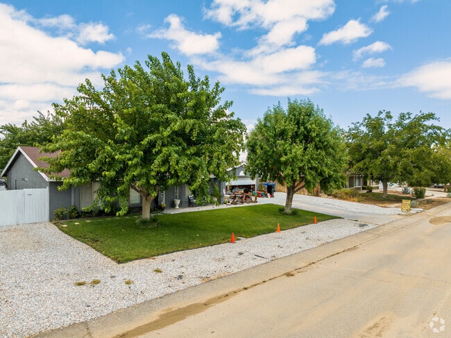 Many homes in Littlerock have shaded lots with manicured grassy lawns.