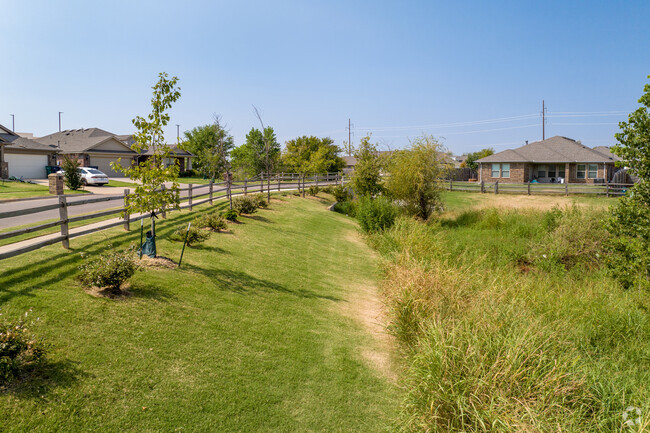 Spring Creek has plenty of green space in the neighborhood between homes.
