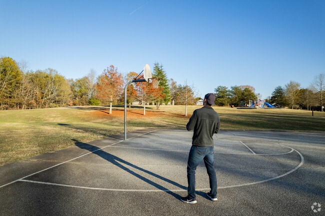 Locals enjoy shooting hoops at the Lincoln Park basketball court in Tigerville.