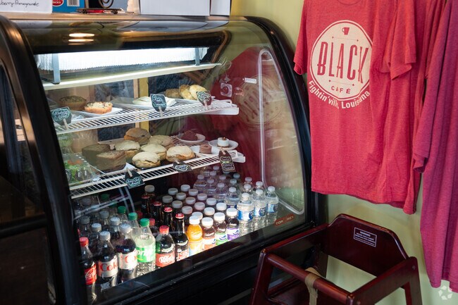 Banana bread, cinnamon rolls, and more are available at Black Cafe in Mills.