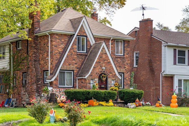 A brick, single family home with Tudor influences adds a storybook charm to Grandmont 1.