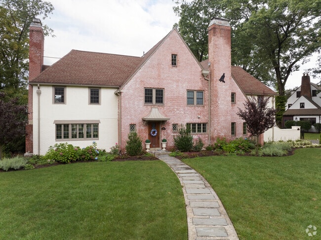 A stunning Victorian with a path to lead to a lovely walk in Forest Park.
