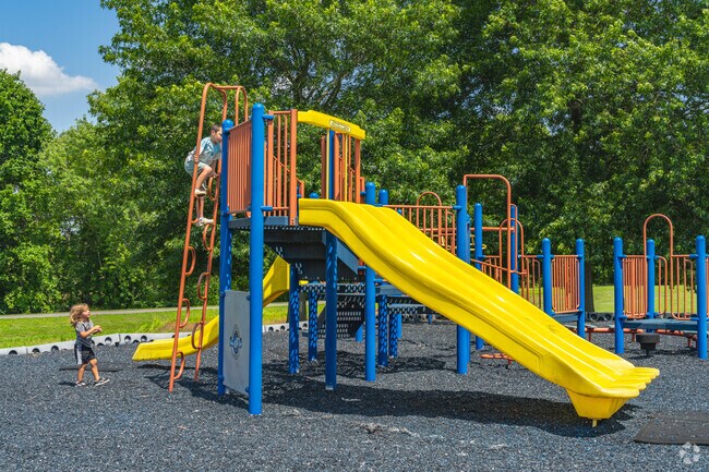 Tire out the tykes on the playground at Veterans Park.