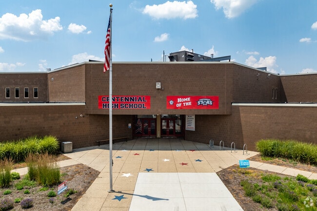Students finish off their public school education at Centennial High School near Linworth Village.