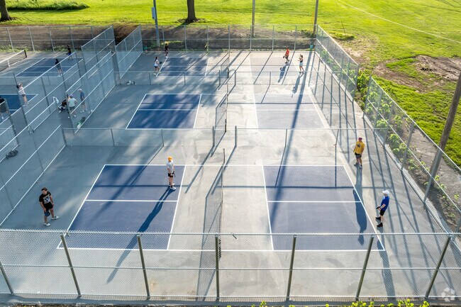 Lucas Farms residents flock to the pickleball courts at Mercer Park.
