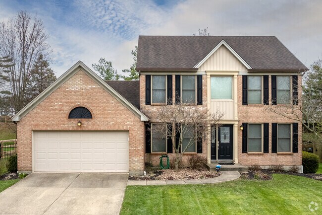 Residents in Cherry Grove often have attached garages and front lawns.