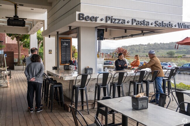 Buonasera New York Pizzaria has a craft beer bar overlooking the ocean in Del Mar Heights.