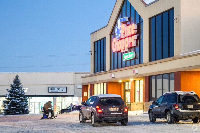 State Route 37 brings strip malls and big-box stores like Price Chopper through Massena.