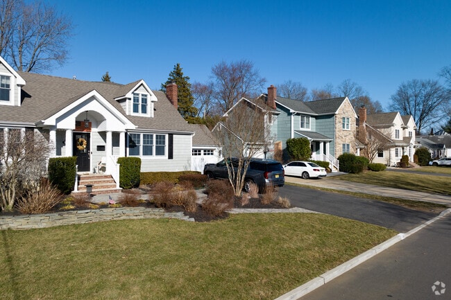 Cape Cod-style homes add timeless charm and character to neighborhoods.