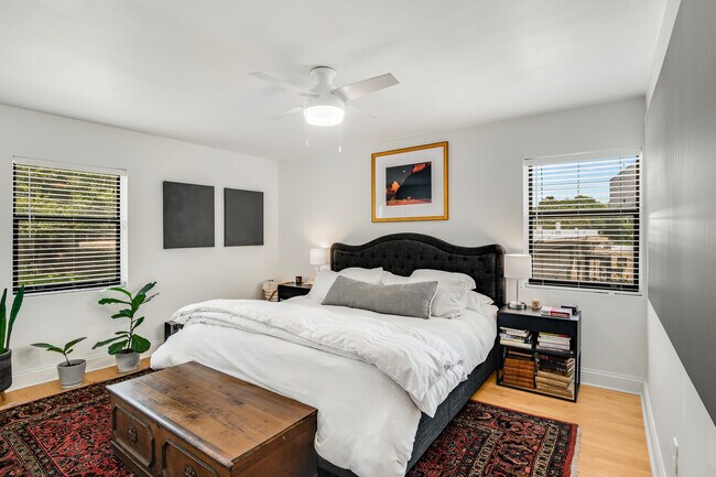Large primary bedroom with tons of natural light!