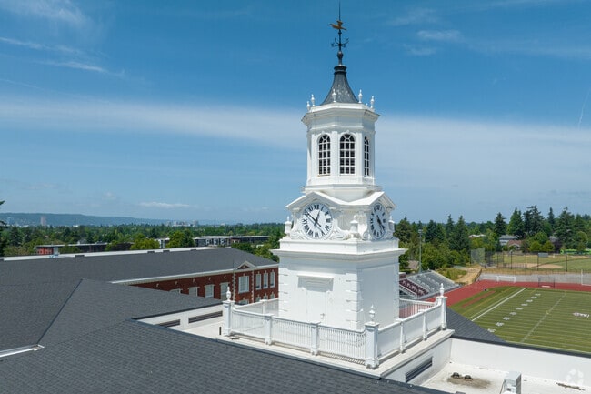 The clock tower on Franklin High on SE Woodward St in Portland watches over the neighborhood.