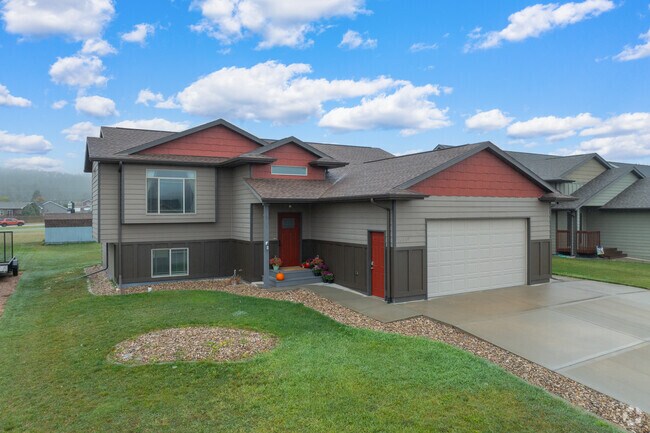 Split-level home in Summerset offers spacious living and curb appeal.
