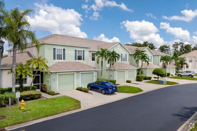 A colorful row of beautiful townhomes in Forest Lake Townhomes.