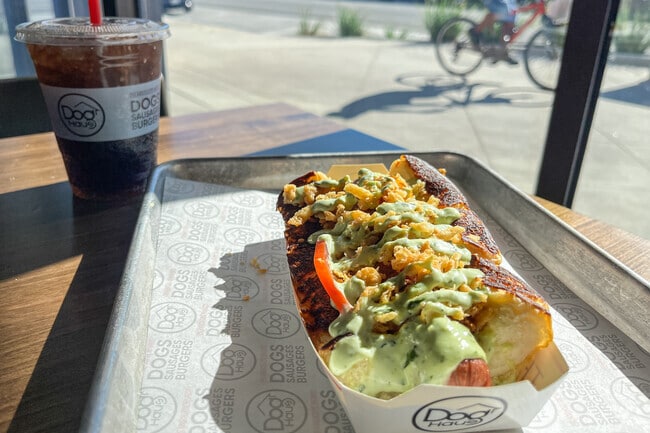 Locals try many of the delicious hot dogs available from Dog Haus located near Rosedale.