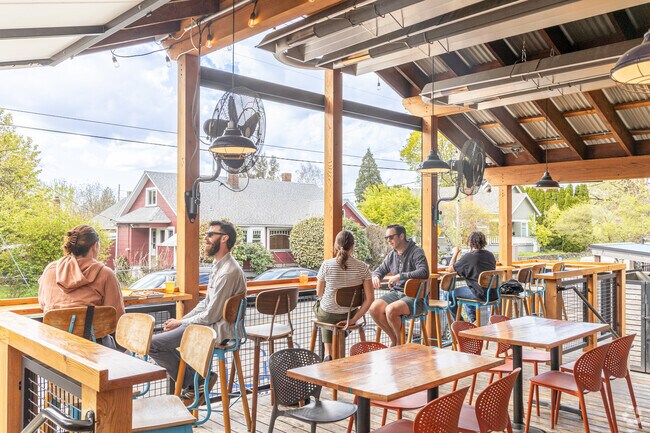 Hinterland's bar and food cart pod offers both indoor and outdoor seating.