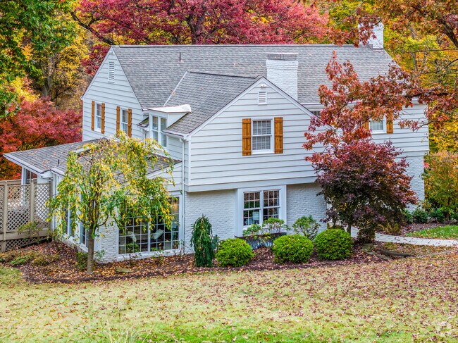 A large custom-built estates sit on a private lot in Bell Acres Borough.