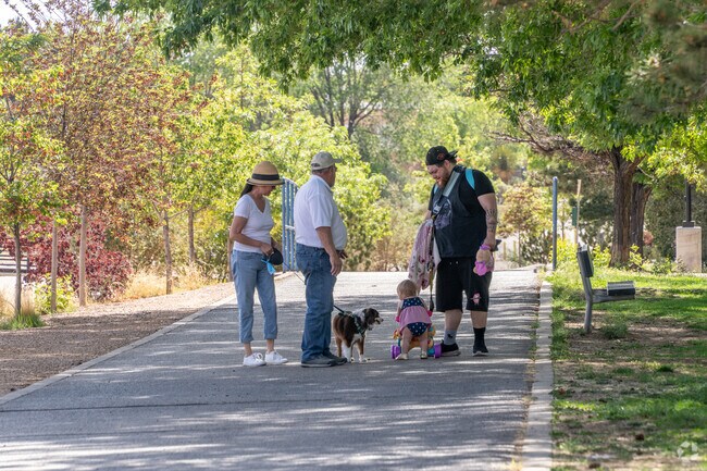 Enjoy the nearby nature trails at El Oso Grande Park for a morning hike.